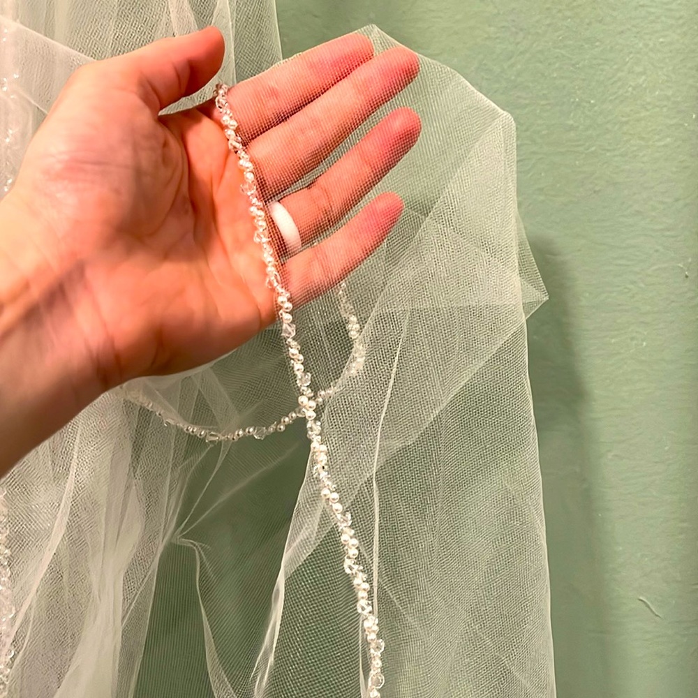 Gorgeous, sheer, chapel length bridal veil